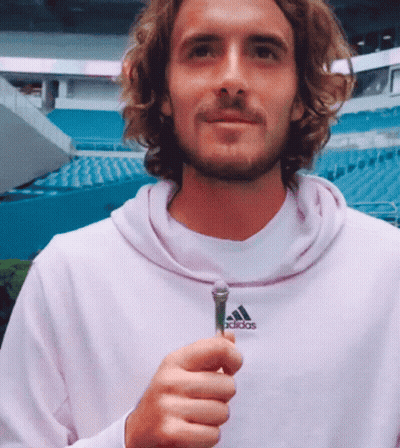 Man In Pink Adidas Sweatshirt Holding Microphone GIF