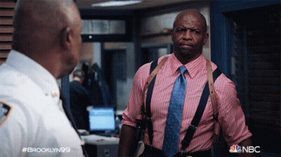 Man In Pink And Blue Striped Shirt Talking GIF