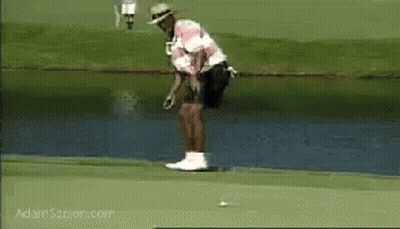Man In Pink And White Shirt Putting Golf Ball GIF