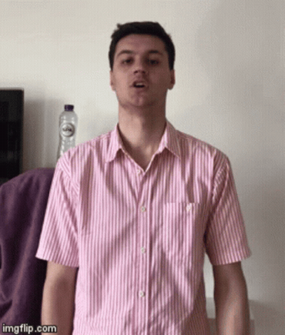 Man In Pink And White Striped Shirt Making Funny Face GIF