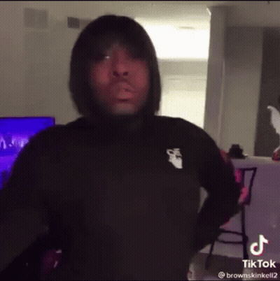 Man In Pink Bandana And Black Jacket GIF
