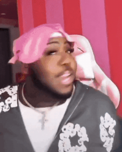 Man In Pink Bandana And Black Jacket GIF