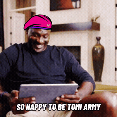 Man In Pink Beret Says So Happy To Be Tomi Army Looking At Tablet GIF