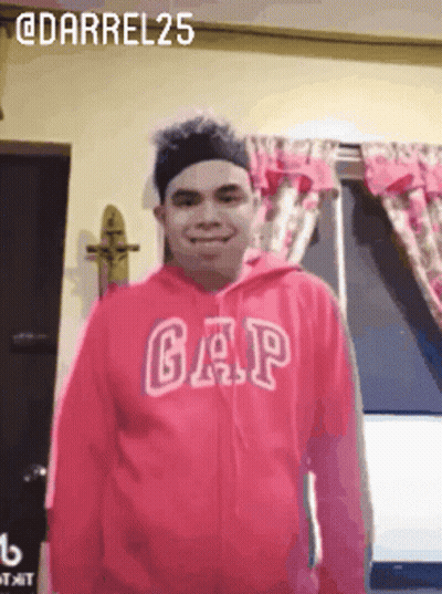 Man In Pink Gap Hoodie Smiling GIF