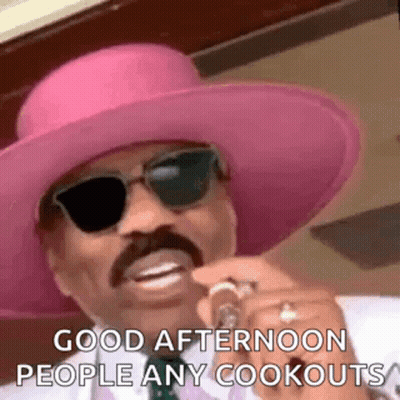 Man In Pink Hat And Sunglasses Holding Microphone GIF