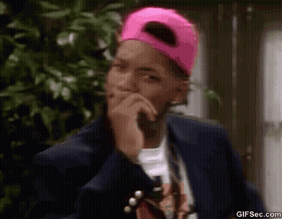 Man In Pink Hat Covering Mouth GIF