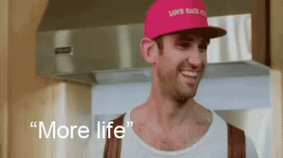 Man In Pink Hat Smiling Saying More Life GIF