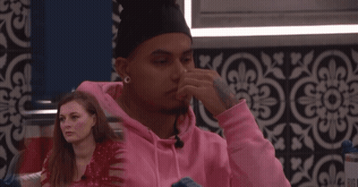 Man In Pink Hoodie Covering Face GIF