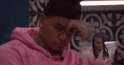 Man In Pink Hoodie Hand On Face GIF