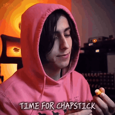 Man In Pink Hoodie Holding Lip Balm Saying Time For Chapstick GIF