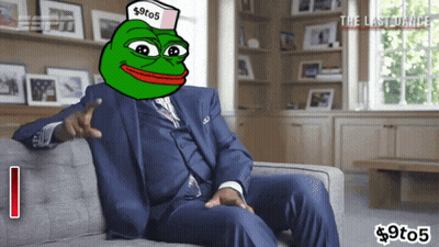 Man In Pink Jacket And Necklace Smiling GIF