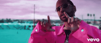 Man In Pink Jacket And Sunglasses Making Funny Face GIF