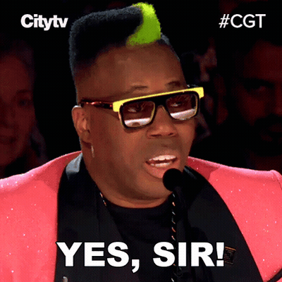 Man In Pink Jacket And Sunglasses Says Yes GIF