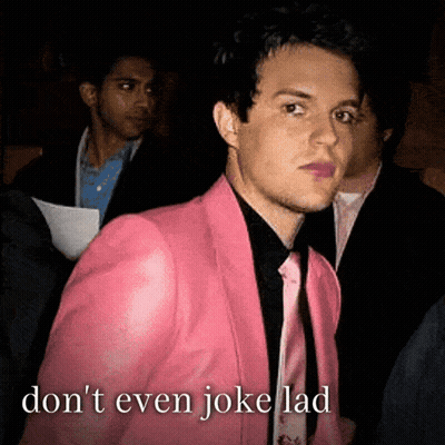 Man In Pink Jacket And Tie Says Don't Even Joke Lad GIF