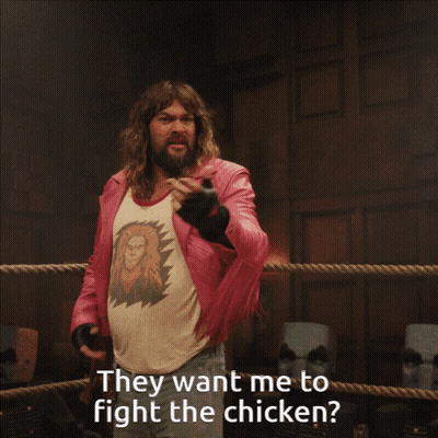 Man In Pink Jacket Boxing Chicken GIF