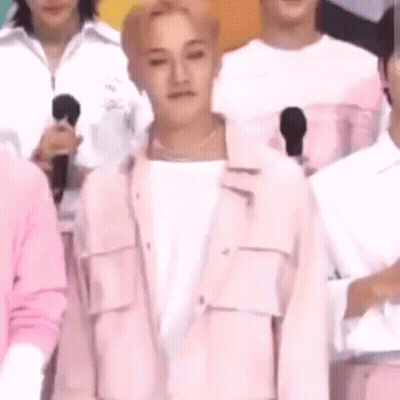 Man In Pink Jacket With Microphones GIF