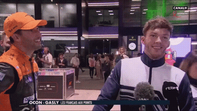 Man In Pink Marathon Jersey Number 12 GIF