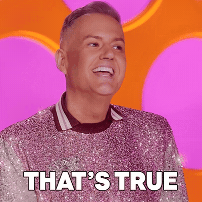 Man In Pink Sequined Sweater Smiling GIF