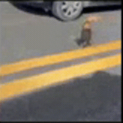 Man In Pink Shirt And Woman In Plaid Playing Tennis GIF