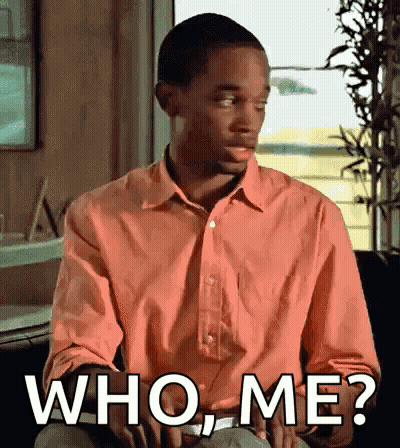 Man In Pink Shirt Asking Who Me GIF