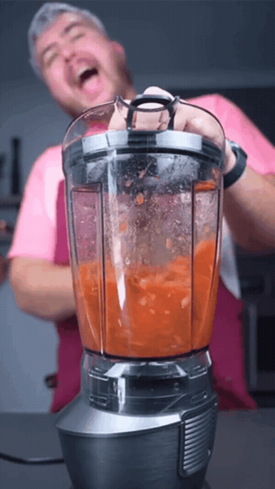 Man In Pink Shirt Blending Smoothie GIF
