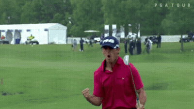 Man In Pink Shirt Celebrating With Golf Club GIF