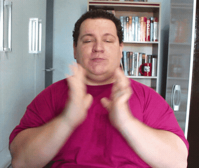 Man In Pink Shirt Clapping GIF