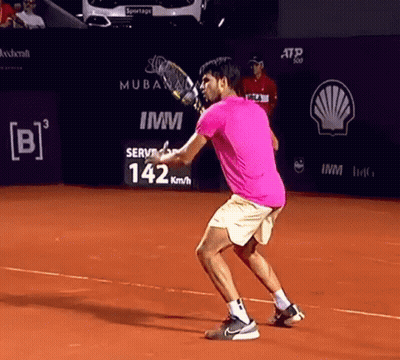 Man In Pink Shirt Playing Tennis GIF