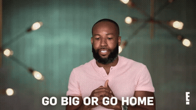 Man In Pink Shirt Saying Go Big Or Go Home GIF