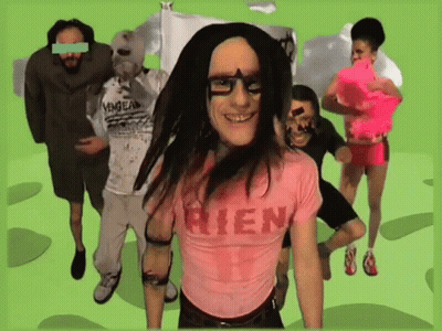 Man In Pink Shirt Saying Rien Surrounded By People GIF