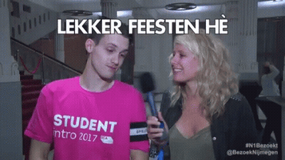 Man In Pink Shirt Saying Student Intro 2017 Talks To Woman With Microphone GIF
