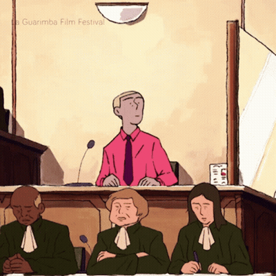 Man In Pink Shirt Sitting At Judge Desk GIF
