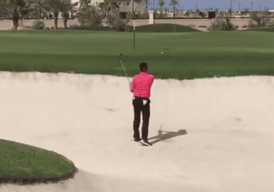 Man In Pink Shirt Swinging Golf Club GIF