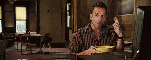 Man In Pink Shirt Talking To Man In Blue GIF