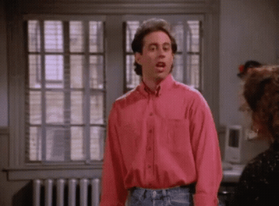 Man In Pink Shirt Talking To Woman GIF