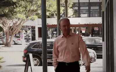 Man In Pink Shirt Walking GIF