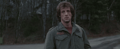 Man In Pink Shirt Waving GIF