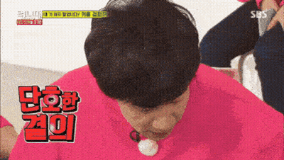 Man In Pink Shirt With Korean Writing GIF