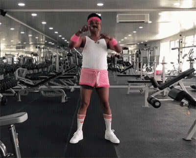 Man In Pink Shorts And White Adidas Socks In Gym GIF