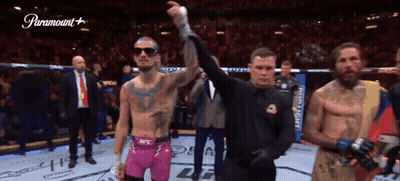 Man In Pink Shorts In Boxing Ring With Paramount Logo GIF