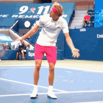 Man In Pink Shorts Playing Tennis 911 Sign GIF