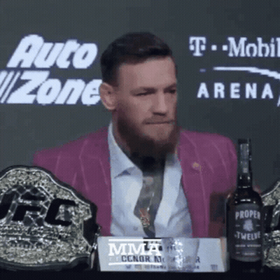 Man In Pink Suit At Auto Zone Arena GIF