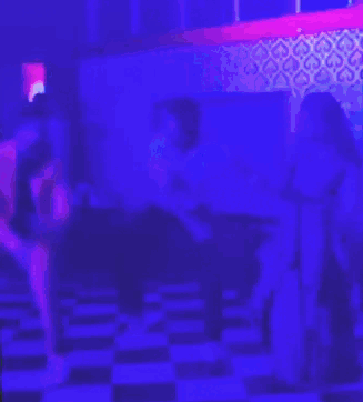 Man In Pink Suit Dancing With Man In White Shirt GIF