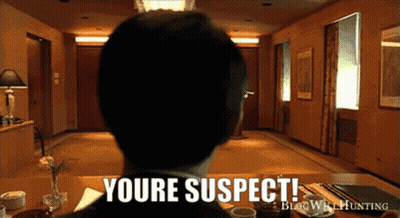 Man In Pink Suit Kneeling On Stage In Front Of Crowd GIF