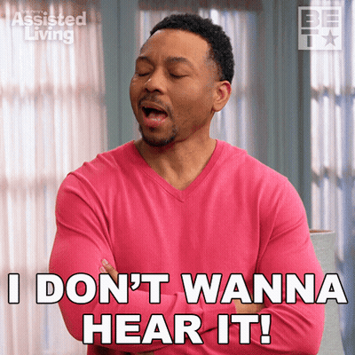 Man In Pink Sweater Says I Don't Wanna Hear It GIF