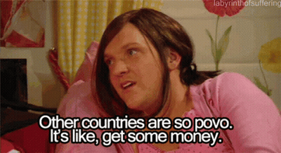 Man In Pink Sweater Says Other Countries Are So Povo GIF