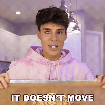 Man In Pink Tie Dye Hoodie Holding Tray Says It Doesn't Move GIF