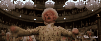 Man In Pink Wig Standing In Front Of Crowd GIF
