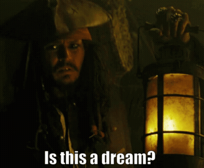Man In Pirate Hat Holding Lantern Says Is This A Dream GIF