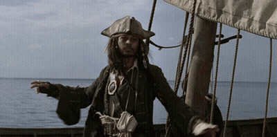 Man In Pirate Outfit On A Boat In The Ocean GIF